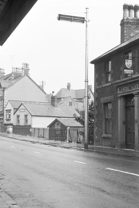 [Old tram-post, modern street-light]
